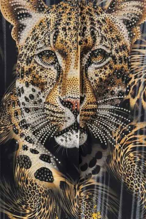 Printed clothing on a model, with the print where it belongs — Macro detail